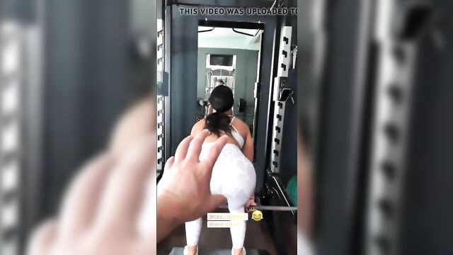 Tenille Dashwood lifting weight, showing off her perfect ass