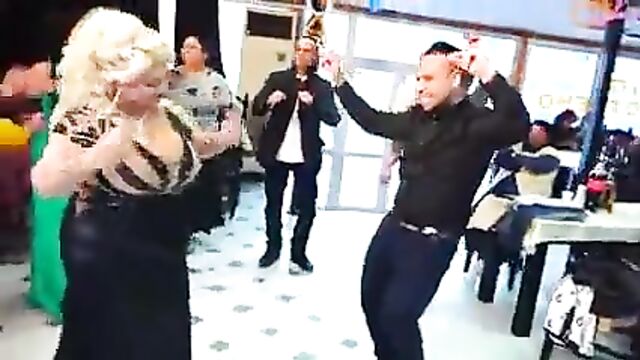 A woman with a huge bust dancing 5