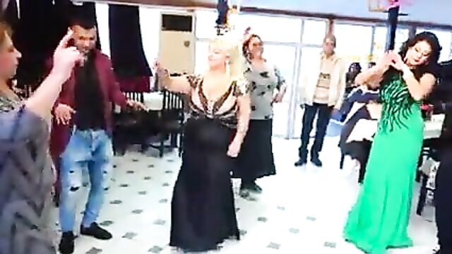 A woman with a huge bust dancing 5