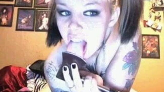 Tattooed Slut Wanks it with a Hatchet Handle !