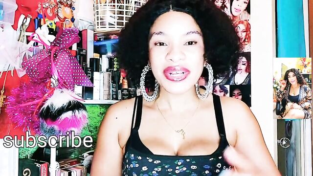 Pretty black woman massages big boobs for Youtube