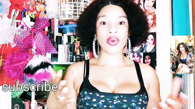 Pretty black woman massages big boobs for Youtube