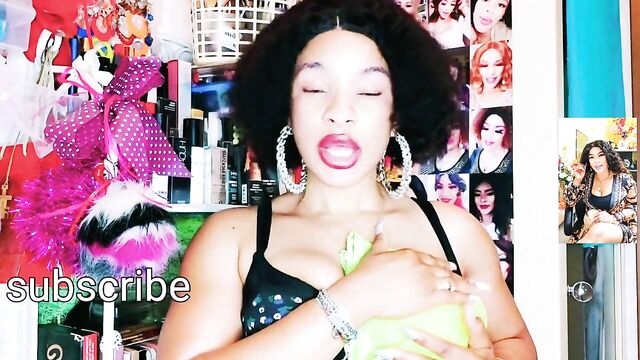 Pretty black woman massages big boobs for Youtube