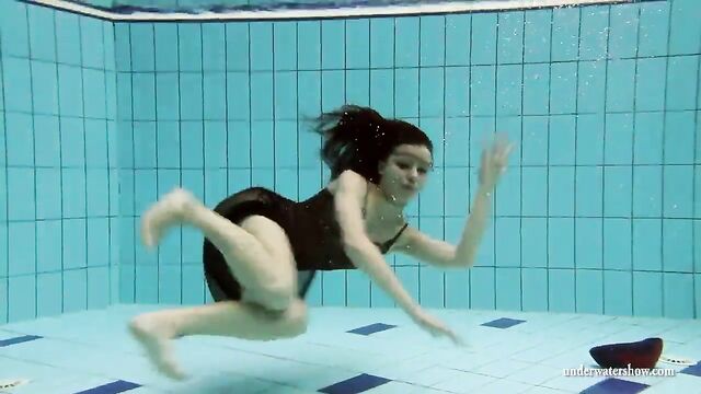 Kristy in a see through dress underwater