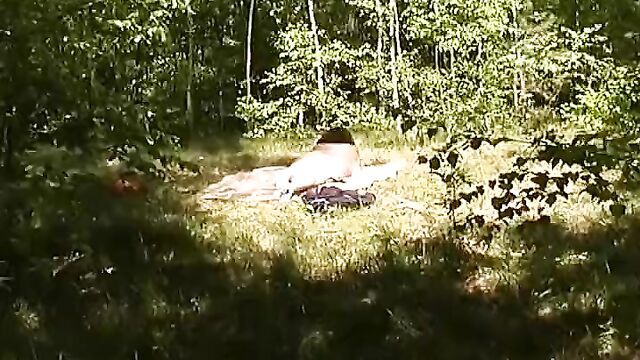 Sexy German BBW fingering her pussy in the middle of the woods
