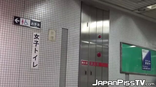 Japanese ladies taped pissing in public bathroom