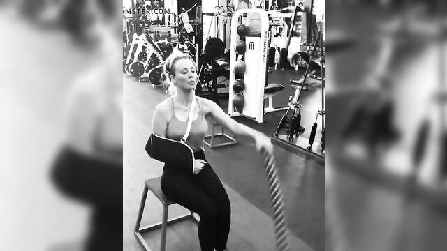 Kaley Cuoco working out with pokie nipples, arm in a sling