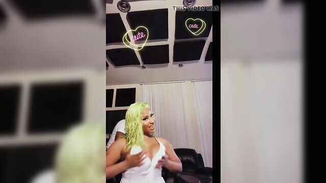 Nicki Minaj playing with her giant boobs, has nipple slip