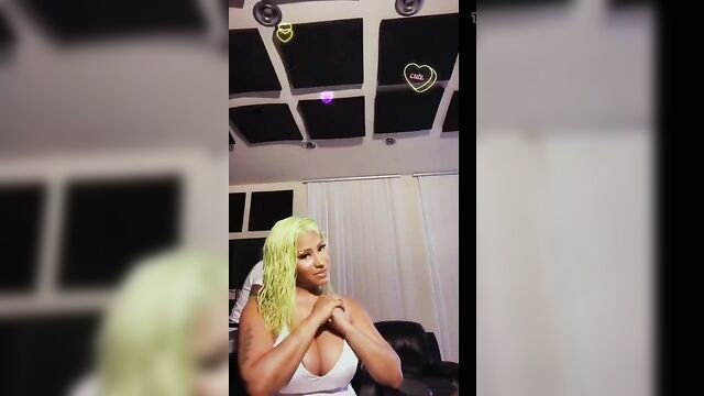 Nicki Minaj playing with her giant boobs, has nipple slip