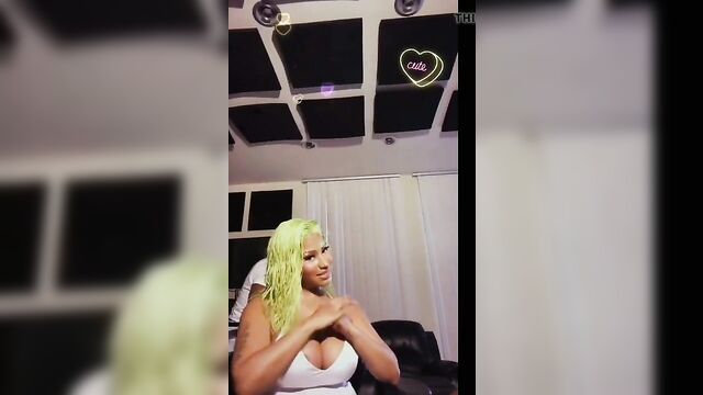 Nicki Minaj playing with her giant boobs, has nipple slip