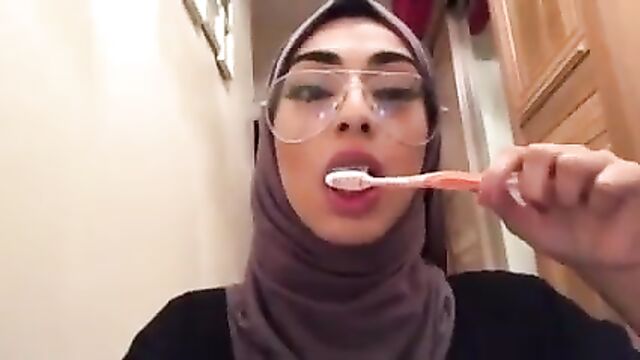 Hijabi Brushing her Pretty Teeth