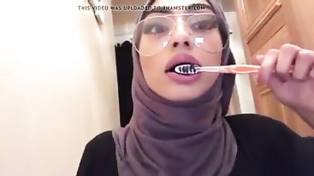 Hijabi Brushing her Pretty Teeth