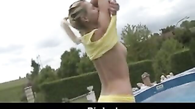Blond teen dildoing her shaved pussy by the pool