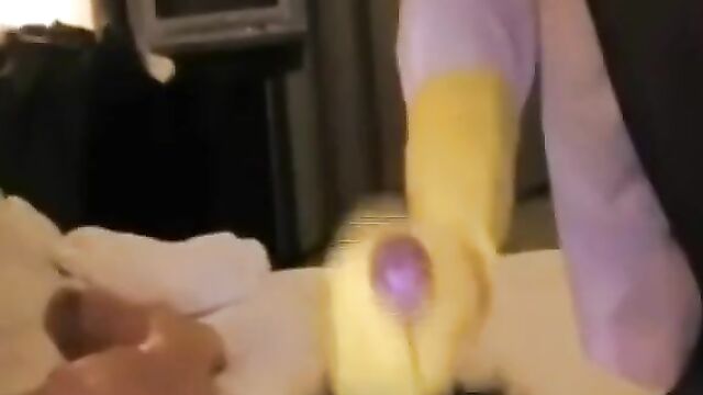 Asian Nurse in Yellow Rubber Gloves Gives a Handjob