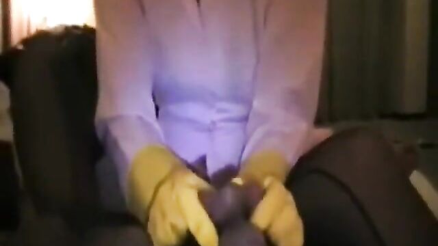 Asian Nurse in Yellow Rubber Gloves Gives a Handjob