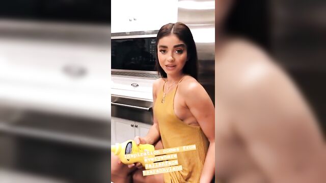 Sarah Hyland with pokie nipples in short yellow dress