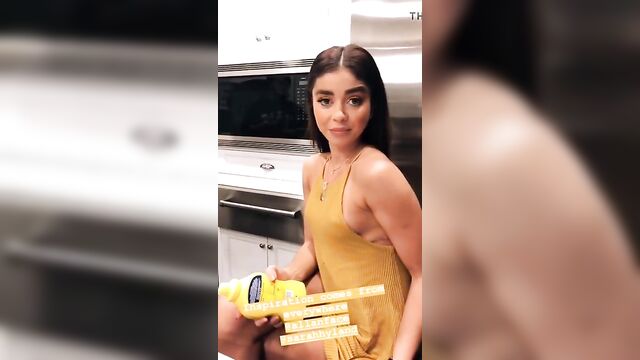 Sarah Hyland with pokie nipples in short yellow dress