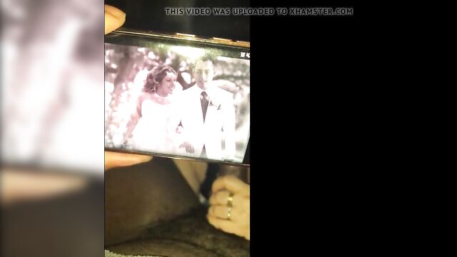Black bull shows wedding photos while she sucks his BBC