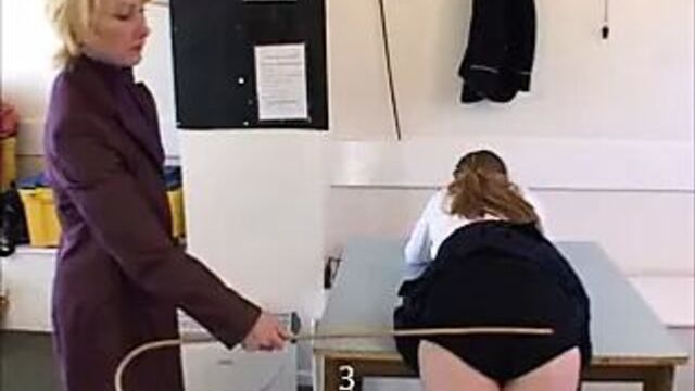 Schoolgirl caned on her navy blue knickers