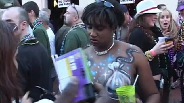 Chicks flash tits for beads at Mardi Gras