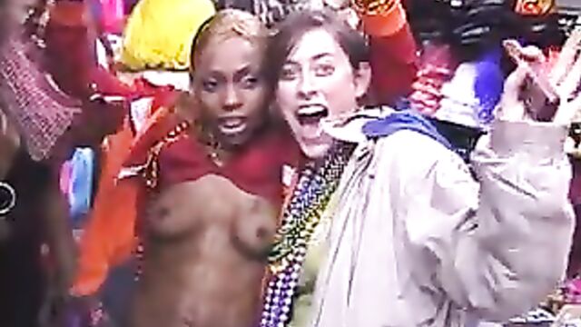 Chicks flash tits for beads at Mardi Gras