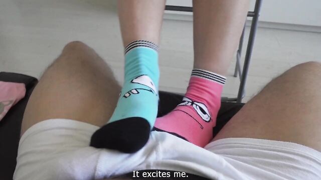 Stepsister does sockjob with stepbrother for the first time.