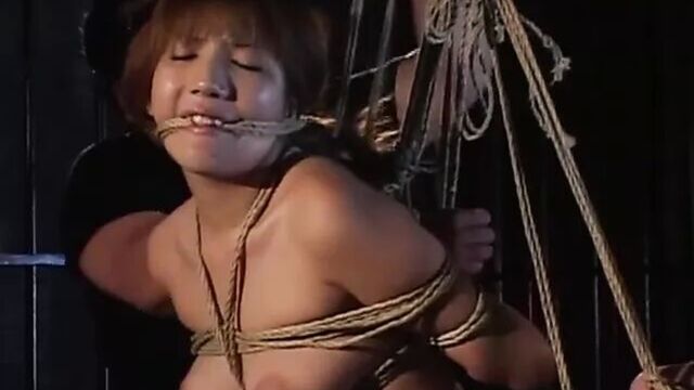 Traditional JAV shibari rope binding with naked schoolgirl