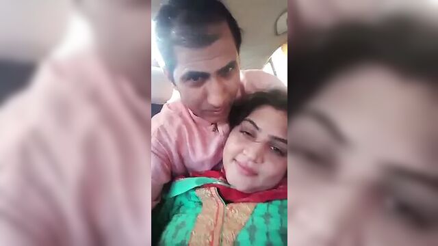 Pakistani couple romance and kissing in car
