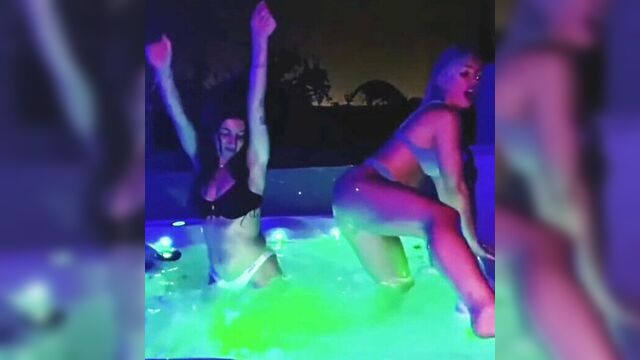 Mandy Rose and a hot brunette dancing in hot tub