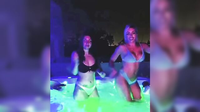 Mandy Rose and a hot brunette dancing in hot tub