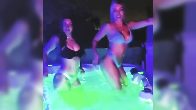 Mandy Rose and a hot brunette dancing in hot tub