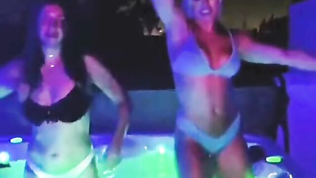 Mandy Rose and a hot brunette dancing in hot tub