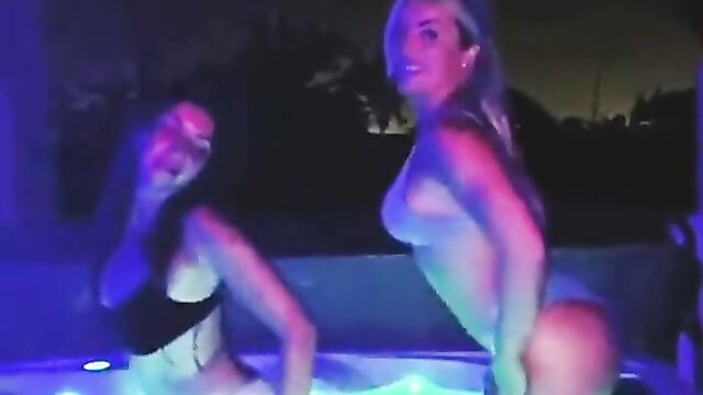 Mandy Rose and a hot brunette dancing in hot tub