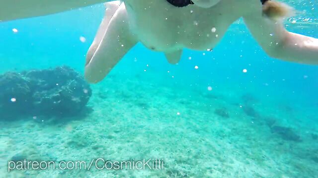 Snorkeling totally naked with the fish and tourists