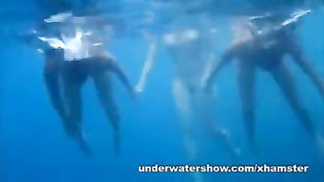 3 girls stripping in the sea