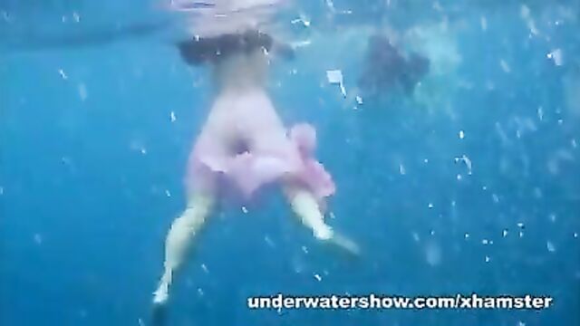 3 girls stripping in the sea