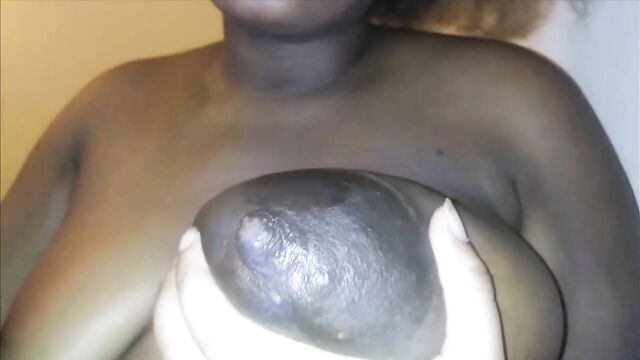 Ebony Youtuber Mia shoots milk out of huge boob rotated