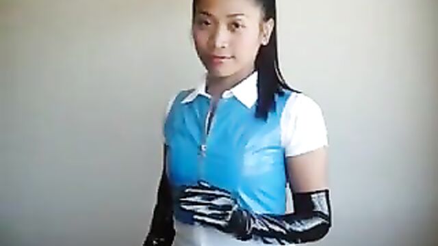 Asian in blue PVC skirt and top