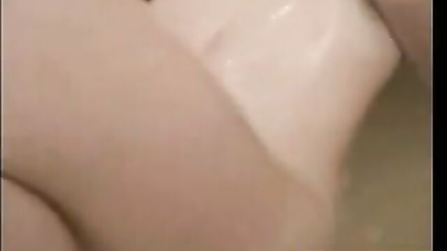 Petite girl masturbating in the bath tub