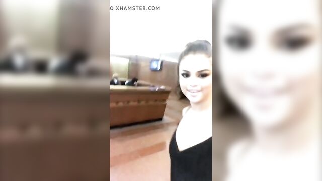 Selena Gomez in a black dress visiting Radio Disney building