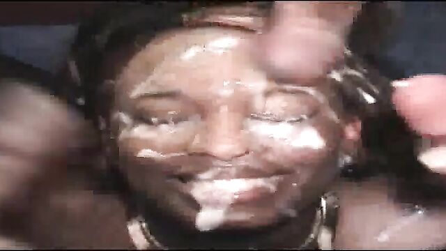 pretty black girl covered in cum