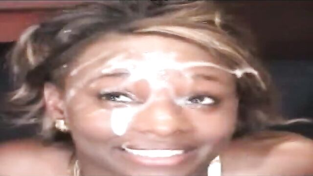 pretty black girl covered in cum