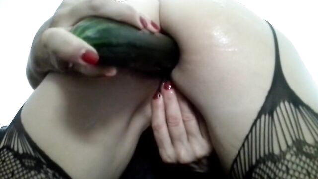 A big zucchini in the pussy and a huge cucumber in the ass