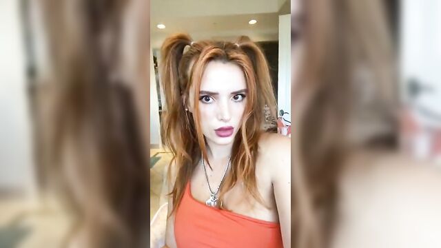 Bella Thorne in orange bikini with pigtails 2