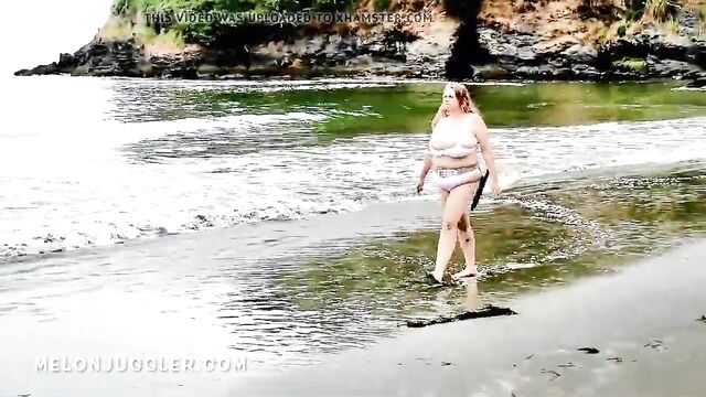 Huge tits BBW beauty emerges from the sea