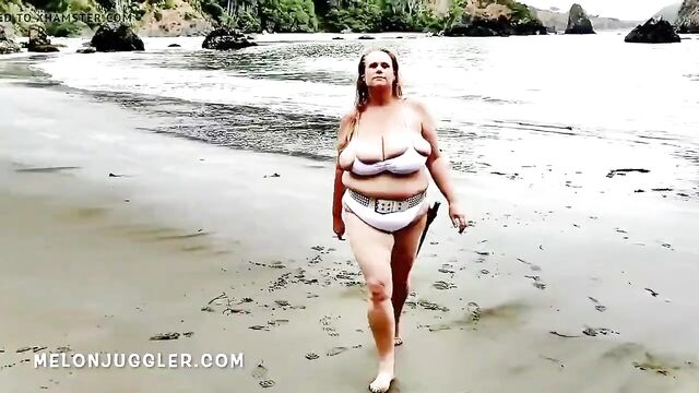 Huge tits BBW beauty emerges from the sea