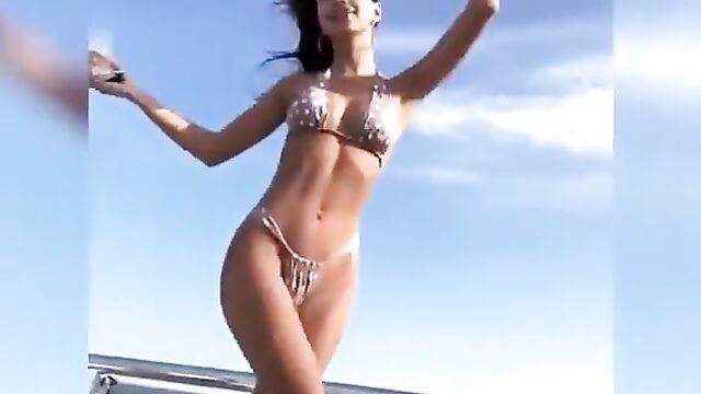 Emily Ratajkowski is hot as hell on a on a boat