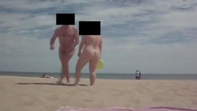 Mr & Mrs Voyeurist00 on Studland Naturist Beach, Frizbeeing