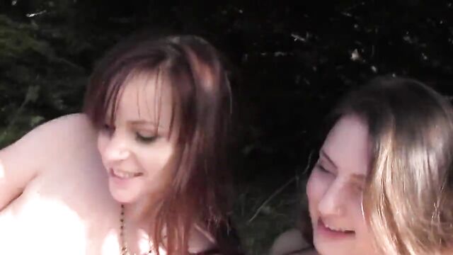 Lesbians Bella Rossi and Missy Minks have fun in nature