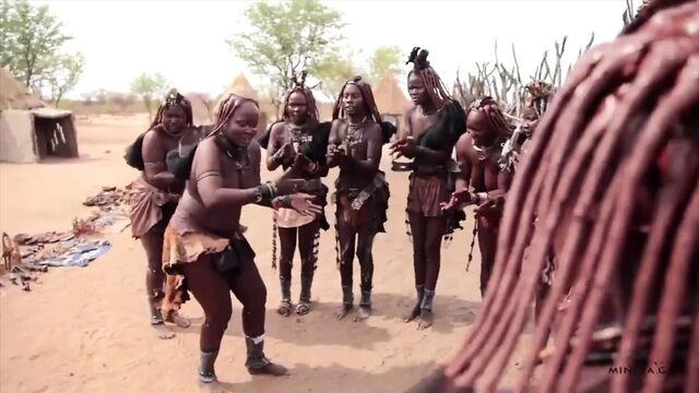 African Himba women dance and swing their saggy tits around